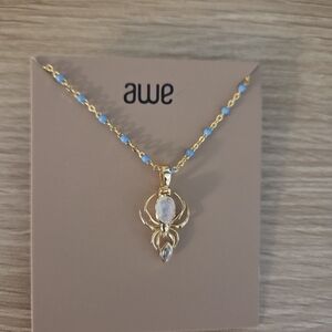 Awe Gold Necklace with Blue Accents